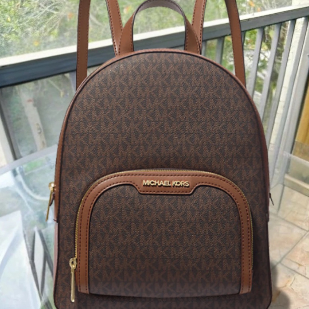 Michael Kors Brown Logo Print Backpack. Brand New With Tag
